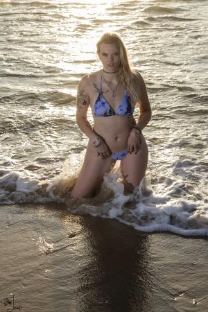 Auteur fotograaf Jaap Van Egmond - strand zee water bikini